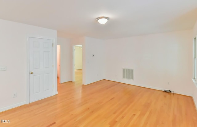 9903 Oak Hollow Rd, Chapel Hill, NC 27516 - empty room with light wood-style floors and baseboards