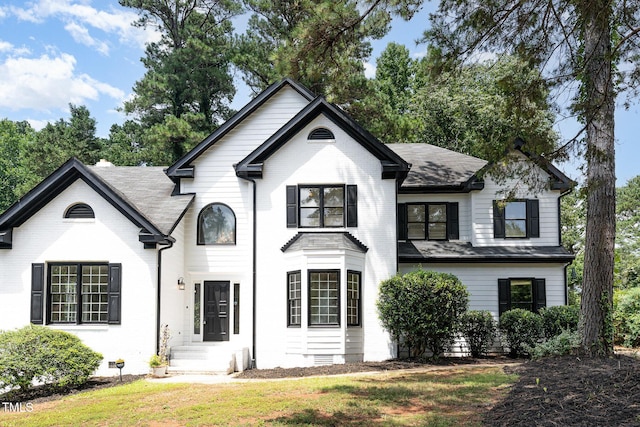 106 Windstream Way, Cary, NC 27518 - view of front of property with brick siding, a shingled roof, and a front yard