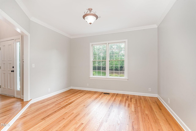 106 Windstream Way, Cary, NC 27518 - spare room with light wood-type flooring and ornamental molding