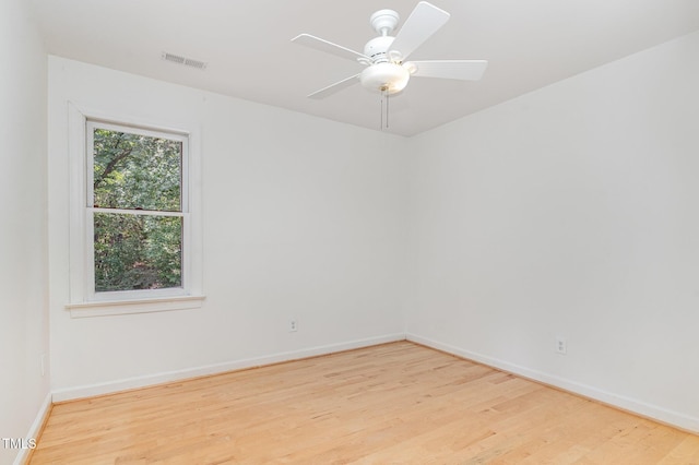 106 Windstream Way, Cary, NC 27518 - empty room with wood finished floors and ceiling fan