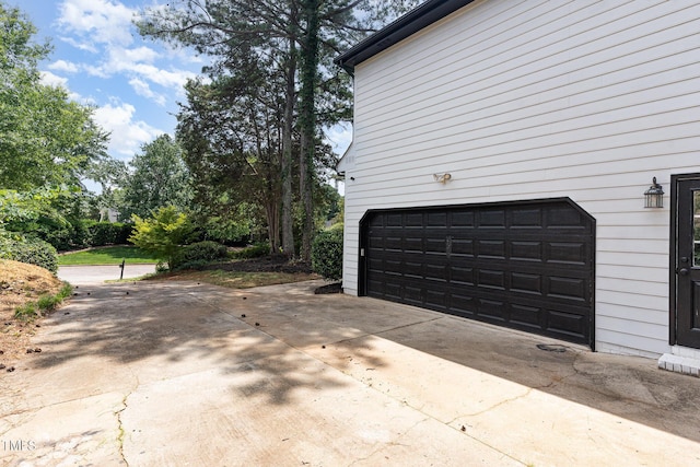106 Windstream Way, Cary, NC 27518 - garage featuring driveway