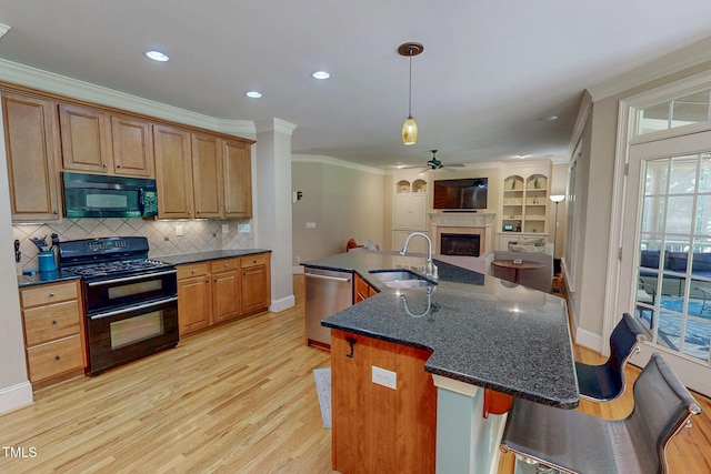 4 Springtree Cir, Durham, NC 27712 - kitchen with black appliances, ornamental molding, ceiling fan, open floor plan, and light wood finished floors