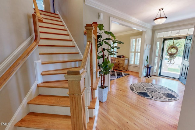 4 Springtree Cir, Durham, NC 27712 - entrance foyer featuring wood finished floors, stairs, and crown molding