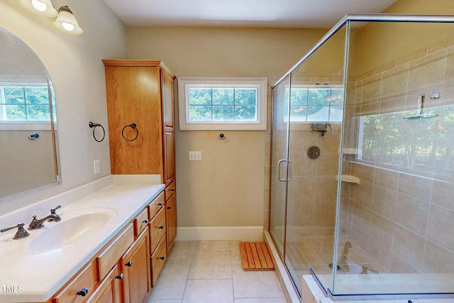 4 Springtree Cir, Durham, NC 27712 - bathroom with healthy amount of natural light, vanity, a stall shower, and tile patterned flooring