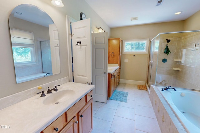 4 Springtree Cir, Durham, NC 27712 - full bath featuring healthy amount of natural light, vanity, a stall shower, and a garden tub