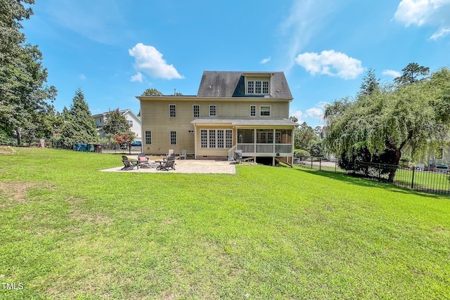 4 Springtree Cir, Durham, NC 27712 - rear view of property featuring a sunroom, a patio area, a fenced backyard, and a fire pit