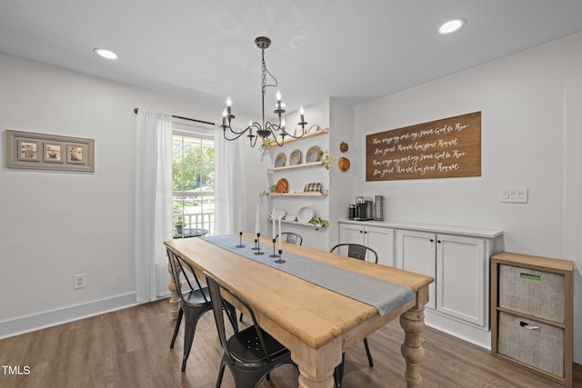 1604 Farm Lake Dr, Holly Springs, NC 27540 - dining space featuring a chandelier, wood finished floors, and recessed lighting