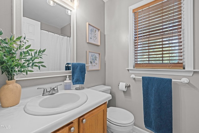 1604 Farm Lake Dr, Holly Springs, NC 27540 - bathroom featuring vanity and toilet