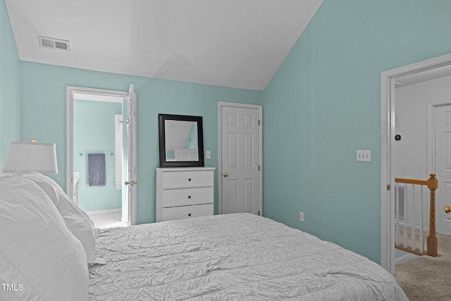 1604 Farm Lake Dr, Holly Springs, NC 27540 - carpeted bedroom with lofted ceiling and baseboards