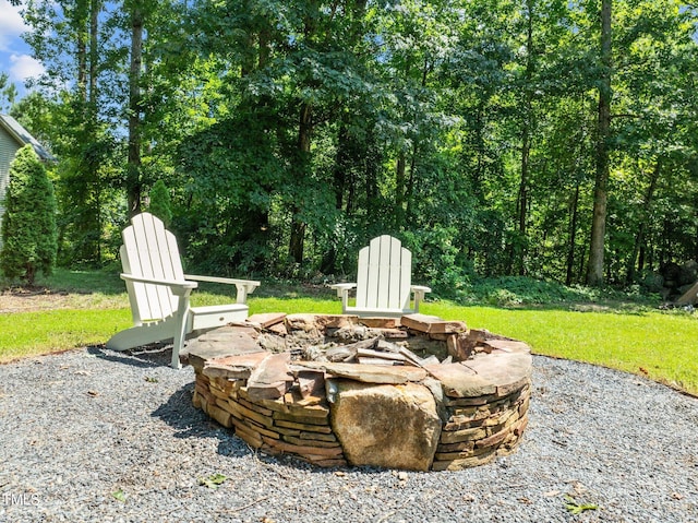 1604 Farm Lake Dr, Holly Springs, NC 27540 - view of patio with an outdoor fire pit