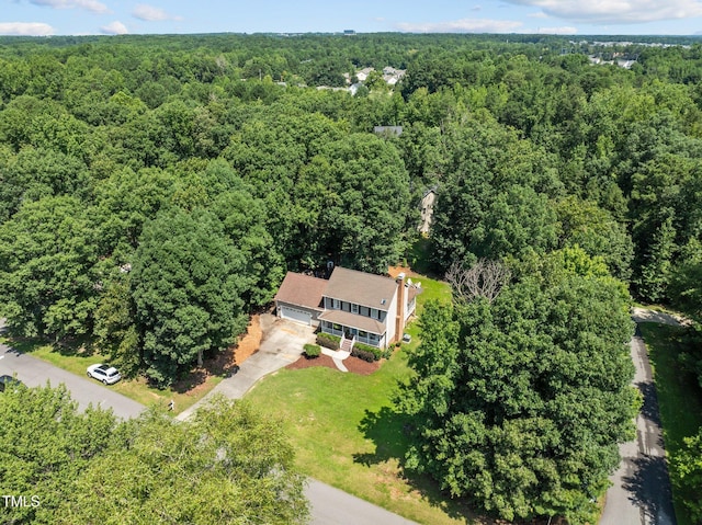 1604 Farm Lake Dr, Holly Springs, NC 27540 - aerial view of property and surrounding area with a forest