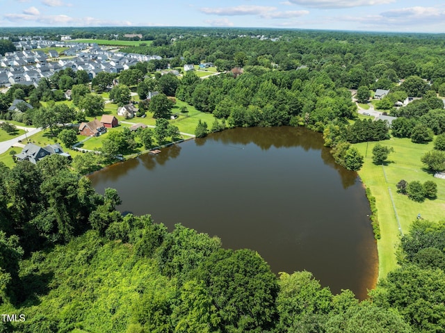 1604 Farm Lake Dr, Holly Springs, NC 27540 - drone / aerial view of a nearby body of water and a heavily wooded area