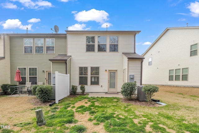 1301 Garden Stone Dr, Raleigh, NC 27610 - back of house with a patio area and a lawn