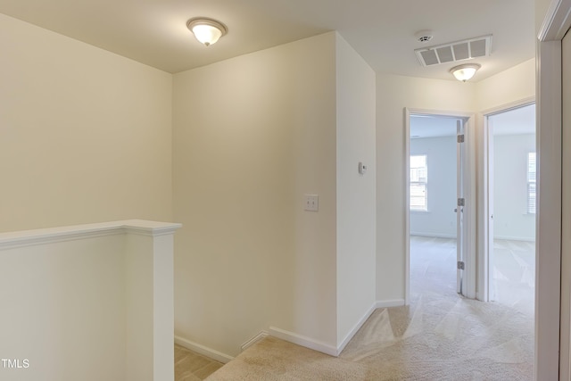 1301 Garden Stone Dr, Raleigh, NC 27610 - hallway featuring light colored carpet and an upstairs landing