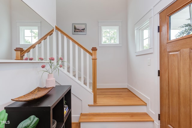 119 W Piedmont Ave, Durham, NC 27707 - entrance foyer with stairs and wood finished floors