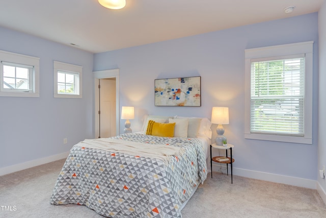 119 W Piedmont Ave, Durham, NC 27707 - bedroom with carpet flooring and baseboards