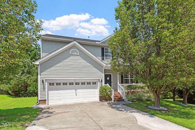 5 Bent Branch Ct, Durham, NC 27704 - view of front of home with concrete driveway, a front lawn, a garage, and a porch