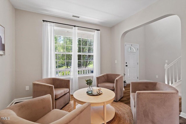 5 Bent Branch Ct, Durham, NC 27704 - living area with arched walkways and wood finished floors