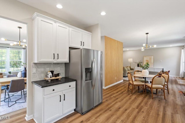 5 Bent Branch Ct, Durham, NC 27704 - kitchen featuring a chandelier, stainless steel fridge with ice dispenser, light wood-style floors, and recessed lighting