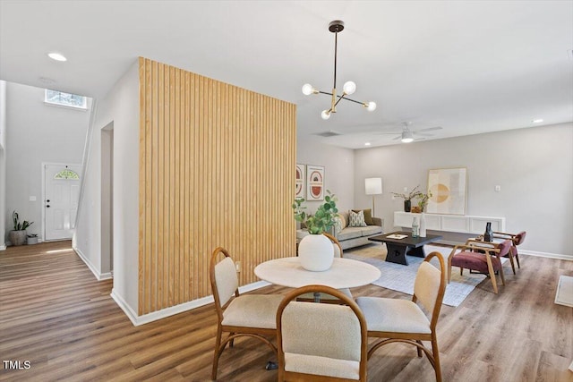 5 Bent Branch Ct, Durham, NC 27704 - dining area featuring light wood-type flooring, ceiling fan, a chandelier, and recessed lighting