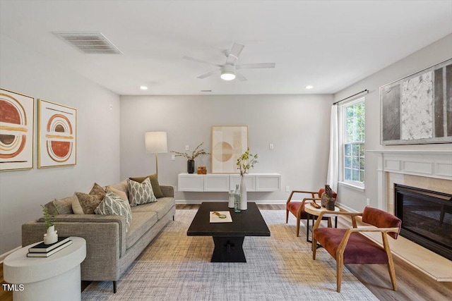 5 Bent Branch Ct, Durham, NC 27704 - living room with a glass covered fireplace, recessed lighting, ceiling fan, and wood finished floors