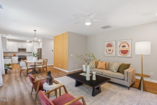 5 Bent Branch Ct, Durham, NC 27704 - living area featuring light wood-style flooring and a ceiling fan