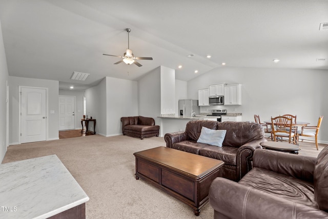 764 Frosty Way, Zebulon, NC 27597 - living area featuring vaulted ceiling, light carpet, a ceiling fan, and recessed lighting