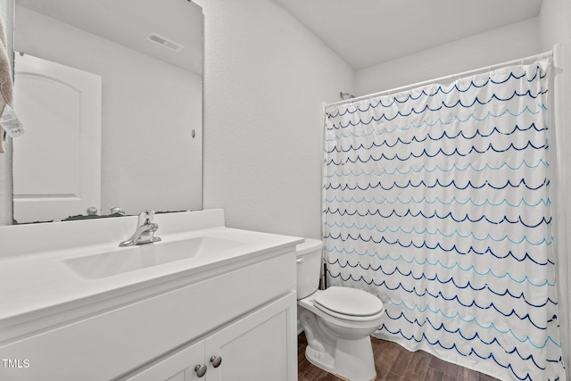764 Frosty Way, Zebulon, NC 27597 - full bath featuring wood finished floors, vanity, and curtained shower