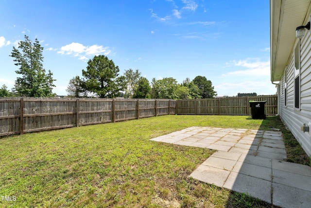 764 Frosty Way, Zebulon, NC 27597 - fenced backyard featuring a patio
