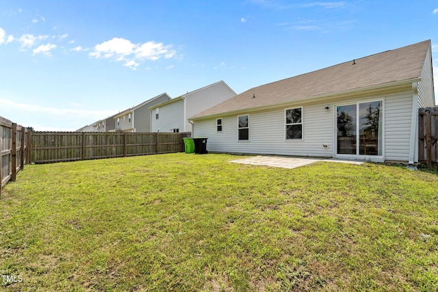 764 Frosty Way, Zebulon, NC 27597 - back of property featuring a patio and a fenced backyard