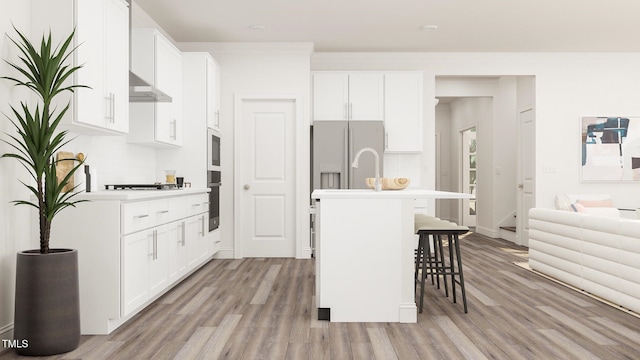 336 Calvander Ln, Apex, NC 27539 - kitchen featuring light wood-type flooring, a kitchen bar, a center island with sink, and gas stovetop