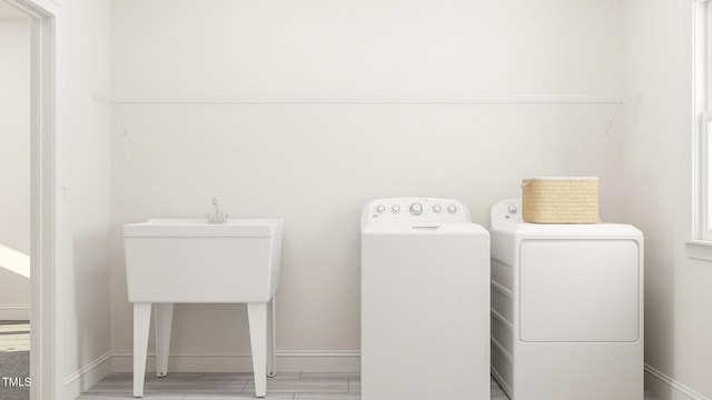 336 Calvander Ln, Apex, NC 27539 - washroom featuring independent washer and dryer and wood finished floors