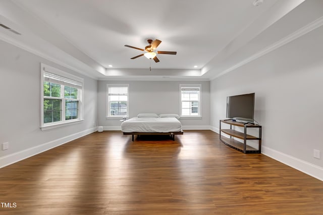 425 Cahors Trl, Holly Springs, NC 27540 - bedroom with a raised ceiling, dark wood-type flooring, recessed lighting, and a ceiling fan