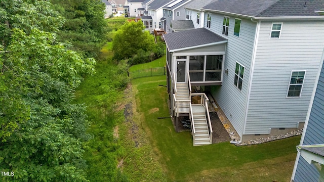 425 Cahors Trl, Holly Springs, NC 27540 - back of house with stairs, a sunroom, crawl space, a residential view, and a shingled roof