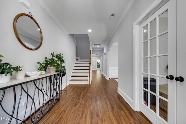 425 Cahors Trl, Holly Springs, NC 27540 - corridor with arched walkways, ornamental molding, dark wood-style flooring, stairway, and recessed lighting