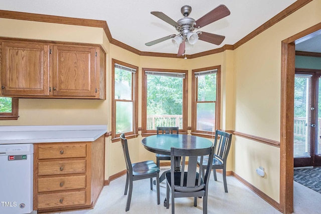 3008 Sgt Pepper Ct, Raleigh, NC 27603 - dining space with ornamental molding, ceiling fan, and light flooring