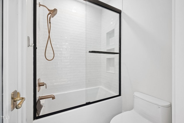 781 Crabtree Crossing Pkwy, Cary, NC 27513 - full bathroom featuring toilet and combined bath / shower with glass door