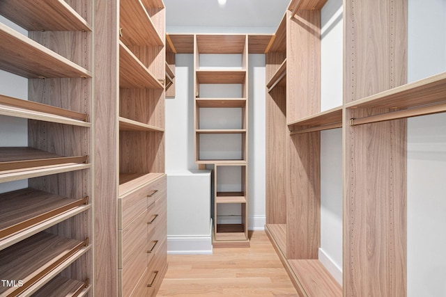 781 Crabtree Crossing Pkwy, Cary, NC 27513 - spacious closet featuring wood finished floors