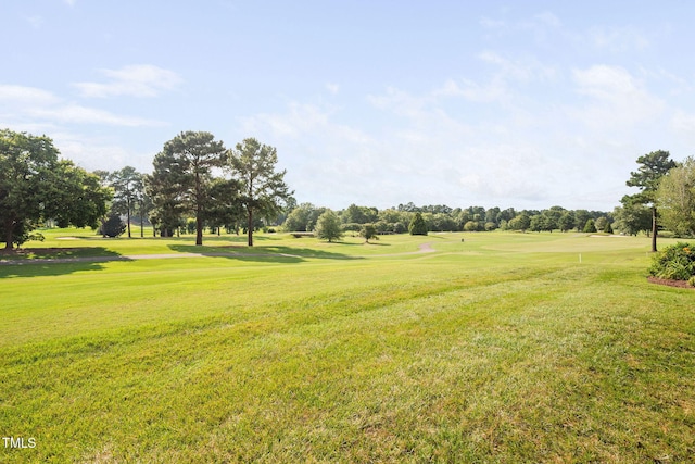 781 Crabtree Crossing Pkwy, Cary, NC 27513 - view of home's community featuring view of golf course, a yard, and view of wooded area