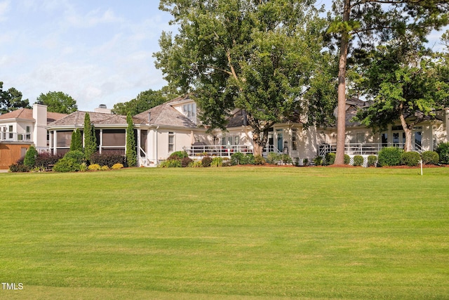 781 Crabtree Crossing Pkwy, Cary, NC 27513 - view of front of house featuring a front lawn and a chimney