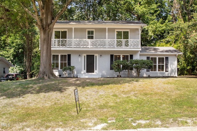 310 E Pilot St, Durham, NC 27707 - view of front of home with a balcony and a front yard