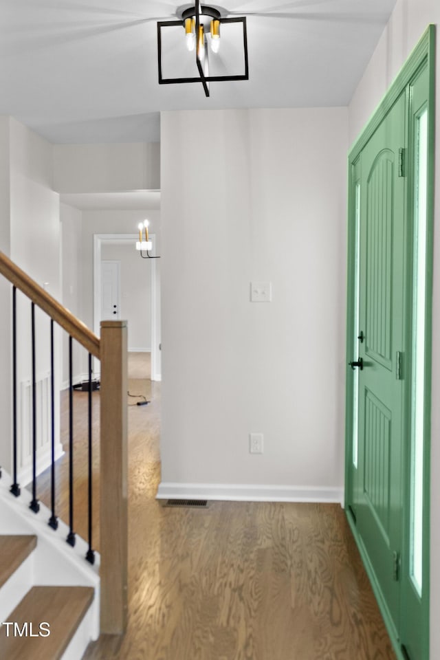 310 E Pilot St, Durham, NC 27707 - entrance foyer with stairway, a chandelier, and wood finished floors