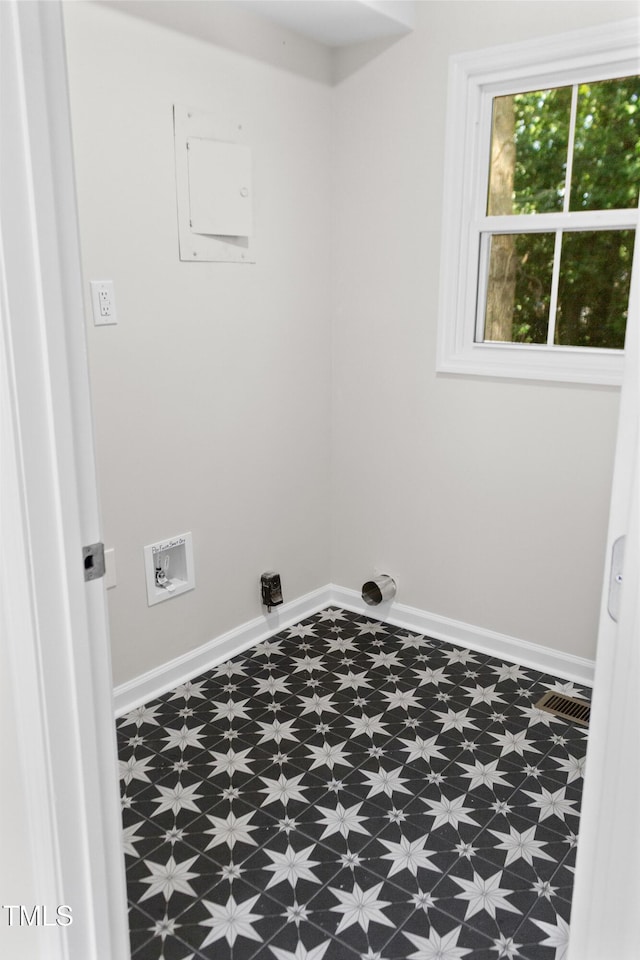 310 E Pilot St, Durham, NC 27707 - washroom with tile patterned floors and hookup for an electric dryer