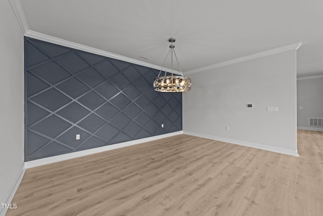 1400 Gathering Park Cir Unit 302, Cary, NC 27519 - unfurnished room with ornamental molding, light wood finished floors, and a chandelier