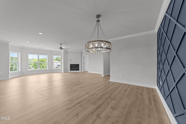 1400 Gathering Park Cir Unit 302, Cary, NC 27519 - unfurnished living room with crown molding, ceiling fan, light wood finished floors, recessed lighting, and a chandelier
