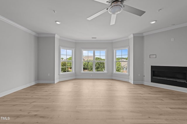 1400 Gathering Park Cir Unit 302, Cary, NC 27519 - unfurnished living room with light wood-type flooring, a glass covered fireplace, crown molding, recessed lighting, and ceiling fan