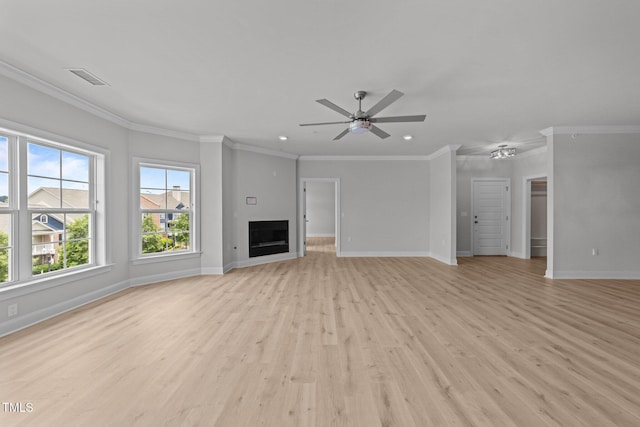 1400 Gathering Park Cir Unit 302, Cary, NC 27519 - unfurnished living room with a ceiling fan, light wood-style flooring, crown molding, recessed lighting, and a fireplace
