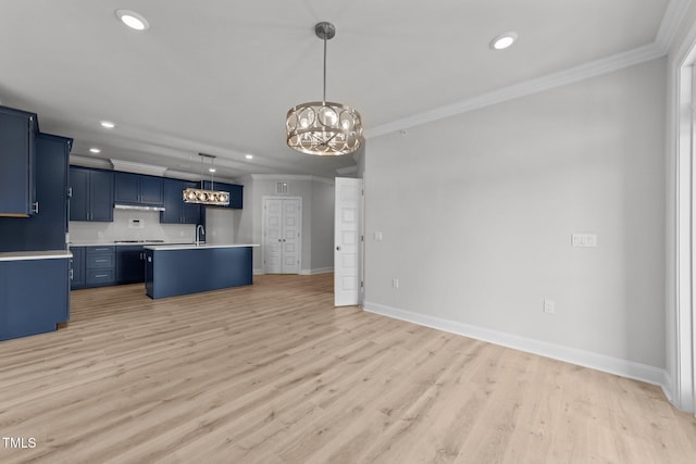 1400 Gathering Park Cir Unit 302, Cary, NC 27519 - kitchen with ornamental molding, blue cabinets, light countertops, a chandelier, and recessed lighting