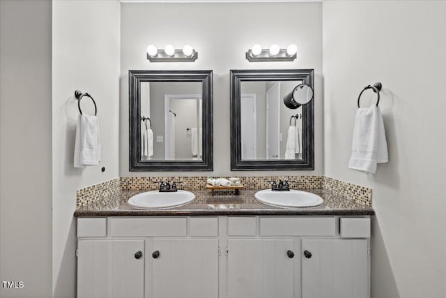 18 Willow Bridge Dr, Durham, NC 27707 - bathroom featuring double vanity and tasteful backsplash