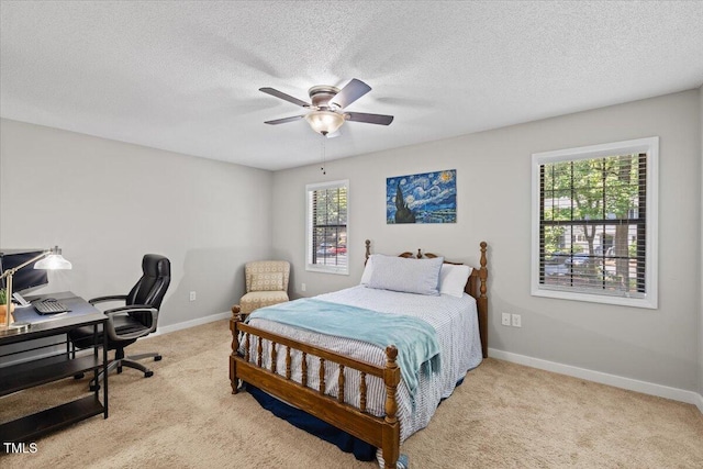 18 Willow Bridge Dr, Durham, NC 27707 - bedroom with carpet flooring, an office area, a textured ceiling, and ceiling fan